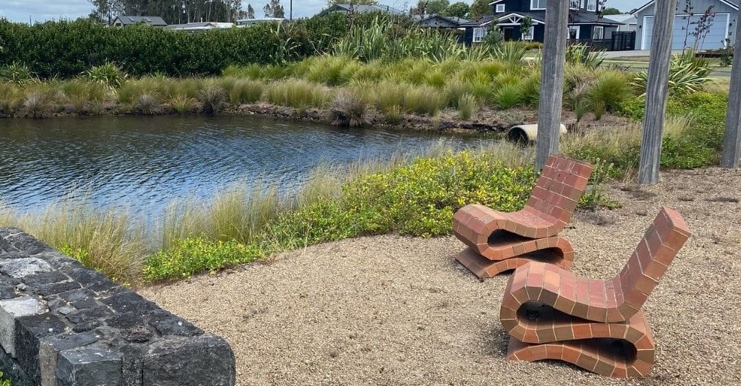 The use of local artist Peter Lange to create suitable unmovable furniture for general use in the reserves add to the character. 5